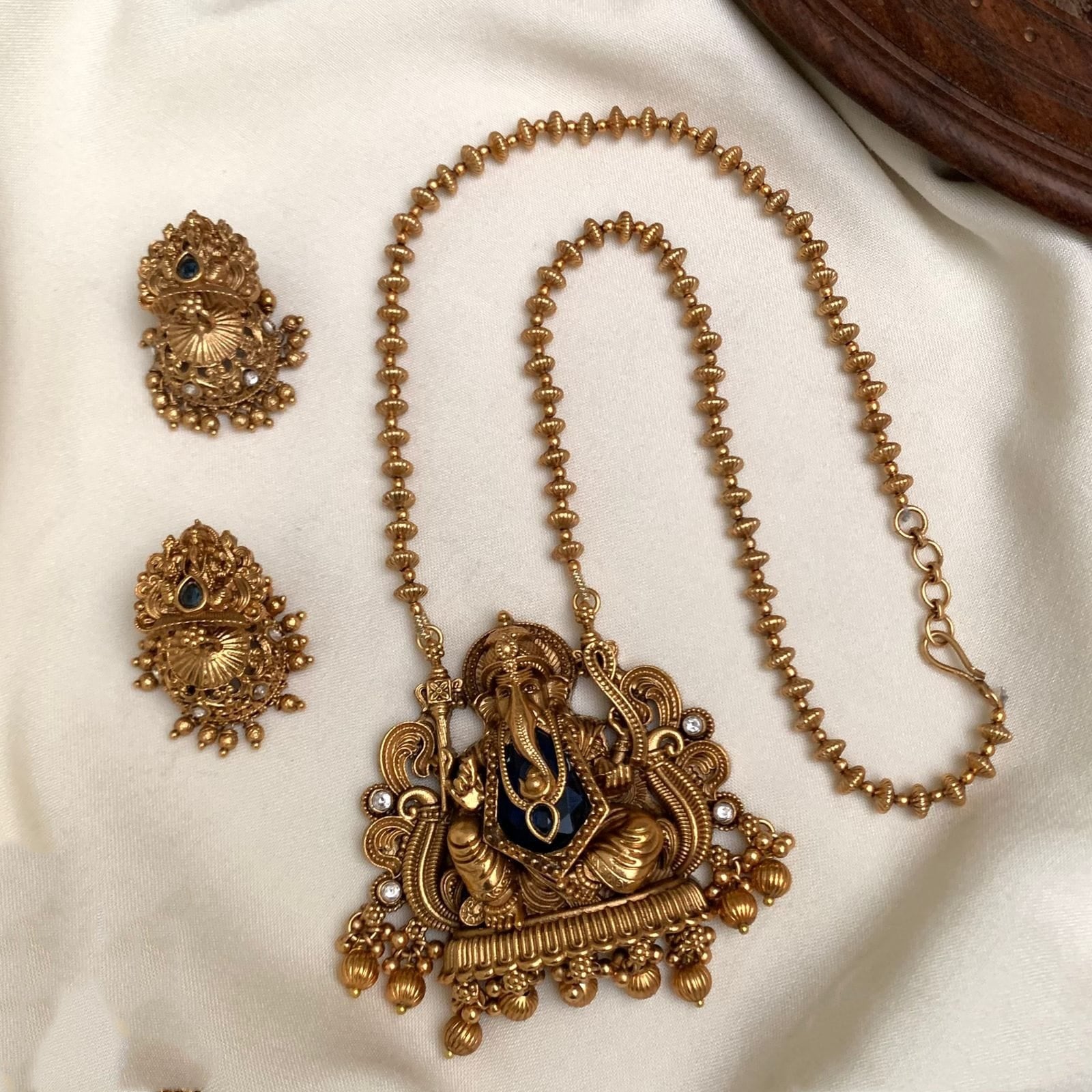 Premium ganesha pendant golden bead ( Red)
